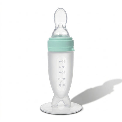 Nomly squeeze spoon feeder in Green